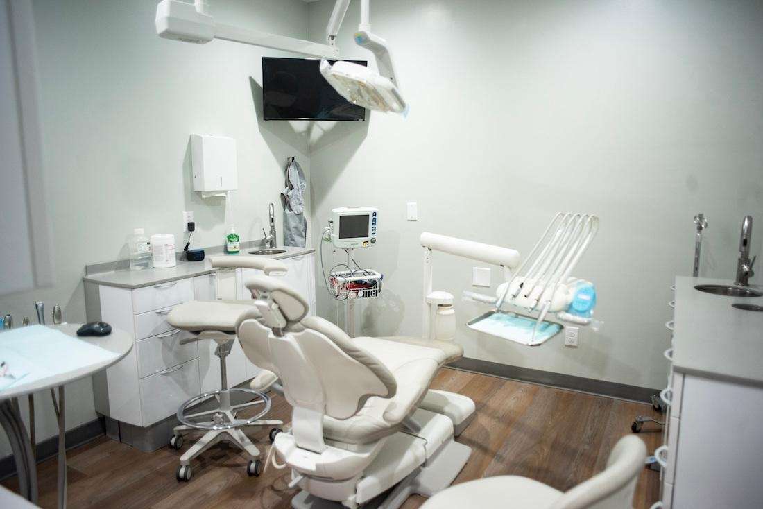 dental chair in treatment room at Vandervoort Family Dentistry